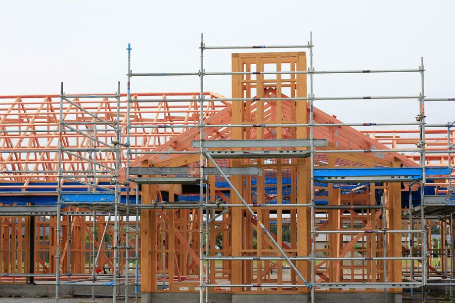 Commercial building under construction with scaffolding